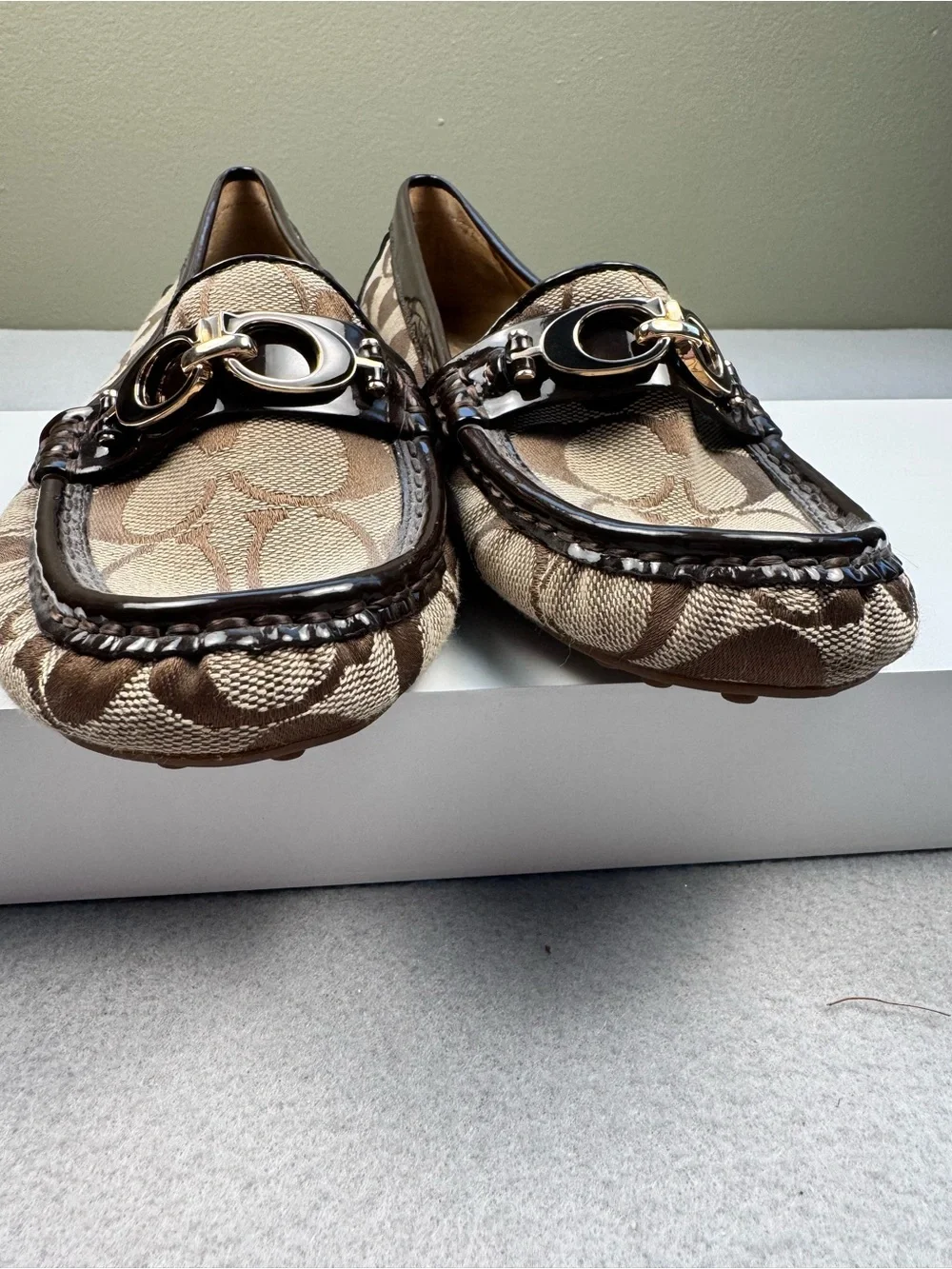Coach Fortunata loafers with Dark Brown Trim and Gold-Tone Chain